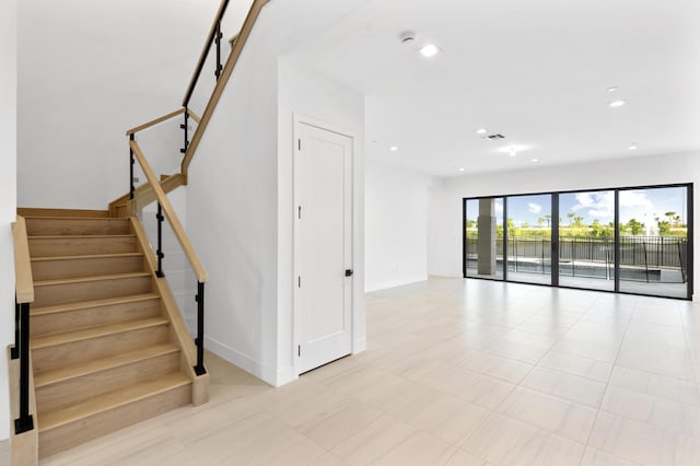 12870 Crane Xing, Palm Beach Gardens, FL 33412 - stairway with recessed lighting