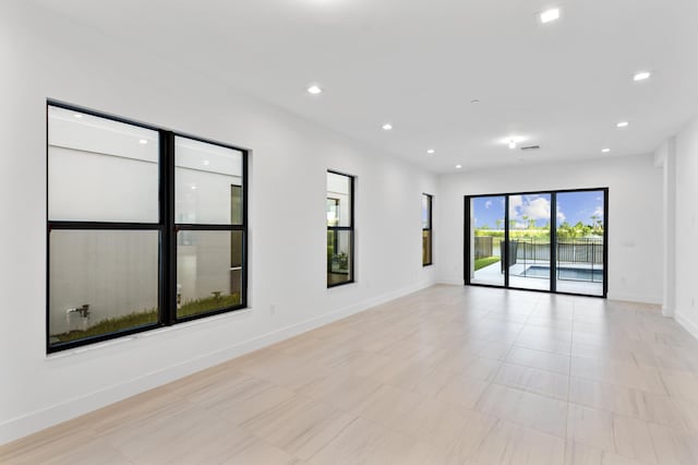 12870 Crane Xing, Palm Beach Gardens, FL 33412 - spare room featuring recessed lighting
