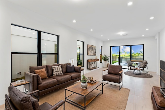 12870 Crane Xing, Palm Beach Gardens, FL 33412 - living area with recessed lighting and light tile patterned floors