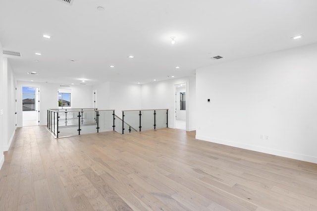 12870 Crane Xing, Palm Beach Gardens, FL 33412 - spare room featuring light wood-type flooring and recessed lighting