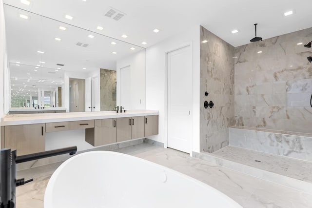 12870 Crane Xing, Palm Beach Gardens, FL 33412 - full bath with a soaking tub, vanity, a marble finish shower, marble finish flooring, and recessed lighting