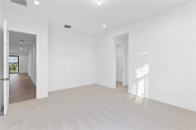 12870 Crane Xing, Palm Beach Gardens, FL 33412 - carpeted empty room with baseboards