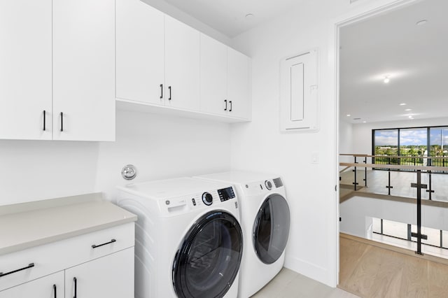12870 Crane Xing, Palm Beach Gardens, FL 33412 - laundry area featuring cabinet space, washer and dryer, and recessed lighting