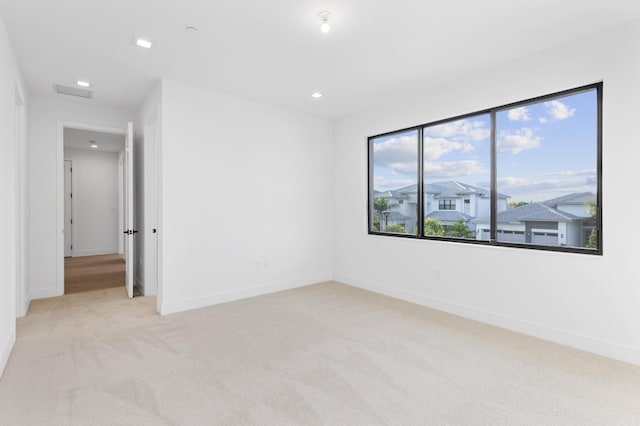 12870 Crane Xing, Palm Beach Gardens, FL 33412 - empty room with light colored carpet and recessed lighting