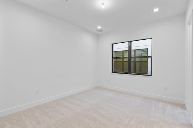 12870 Crane Xing, Palm Beach Gardens, FL 33412 - empty room featuring light carpet and recessed lighting