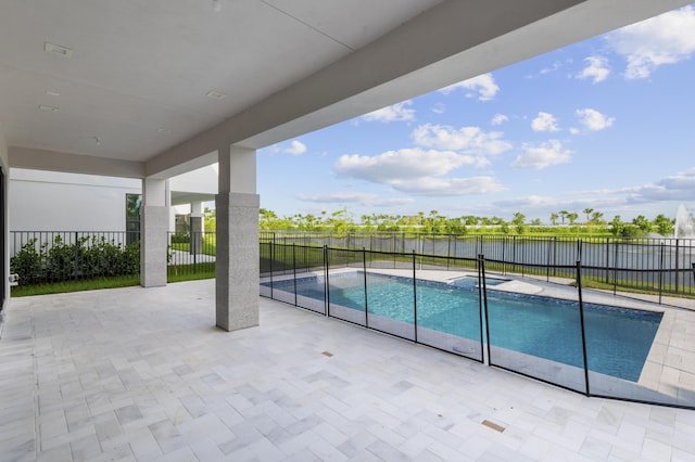 12870 Crane Xing, Palm Beach Gardens, FL 33412 - view of pool with a patio area, a fenced backyard, and a pool with connected hot tub