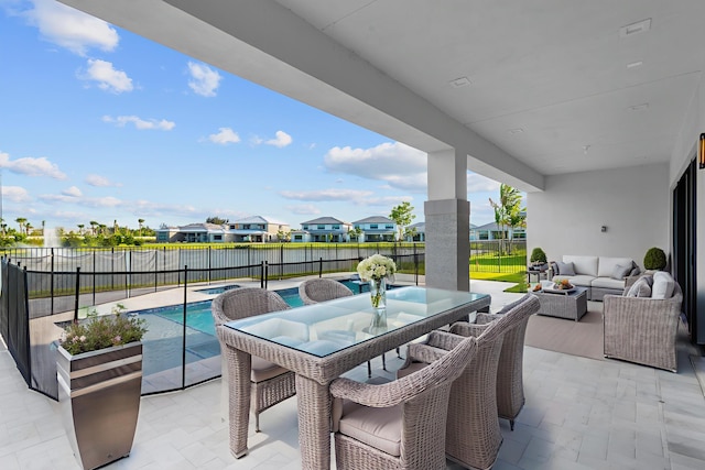 12870 Crane Xing, Palm Beach Gardens, FL 33412 - fenced backyard with an outdoor hangout area, a patio, a residential view, and outdoor dining space