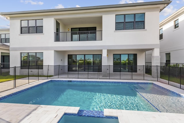 12870 Crane Xing, Palm Beach Gardens, FL 33412 - view of pool with a pool with connected hot tub and a patio area