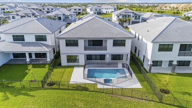 12870 Crane Xing, Palm Beach Gardens, FL 33412 - back of property featuring stucco siding, a residential view, and a fenced backyard