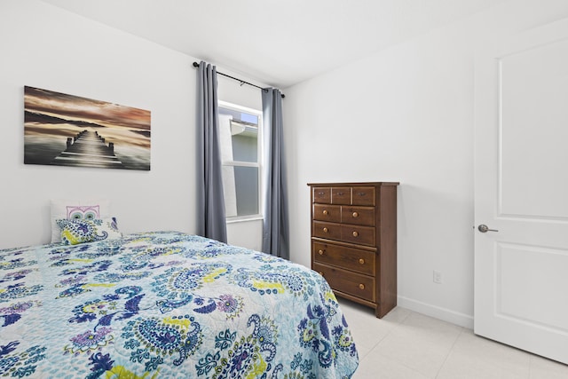 5697 Graceful Way, Delray Beach, FL 33484 - bedroom with light tile patterned flooring and baseboards