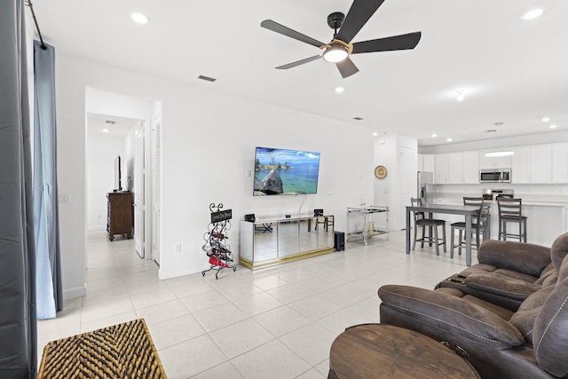 5697 Graceful Way, Delray Beach, FL 33484 - living room featuring ceiling fan, light tile patterned flooring, and recessed lighting