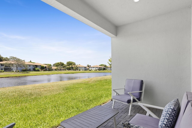 5697 Graceful Way, Delray Beach, FL 33484 - wooden terrace with a water view, a yard, and a residential view