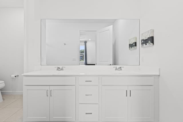 5697 Graceful Way, Delray Beach, FL 33484 - bathroom featuring double vanity and tile patterned flooring