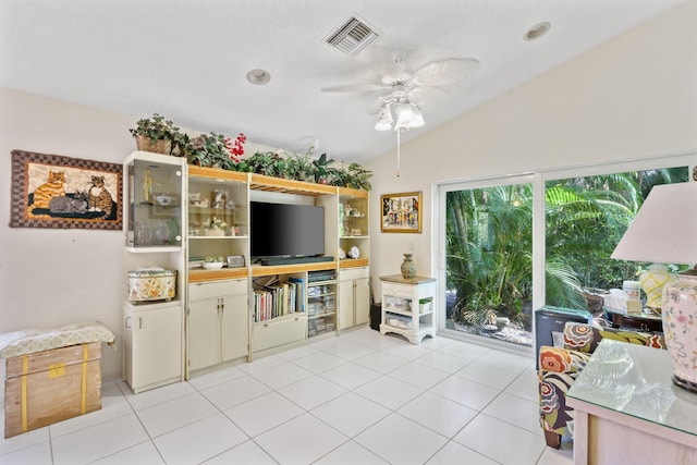 1350 SW 18th St, Boca Raton, FL 33486 - living room featuring lofted ceiling, ceiling fan, and light tile patterned flooring