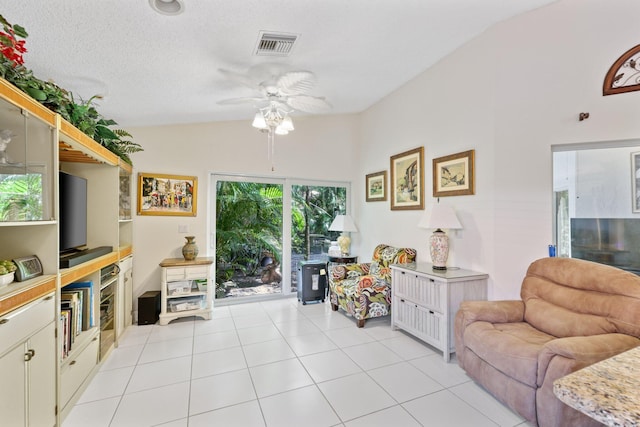 1350 SW 18th St, Boca Raton, FL 33486 - living room featuring a ceiling fan, lofted ceiling, and light tile patterned floors