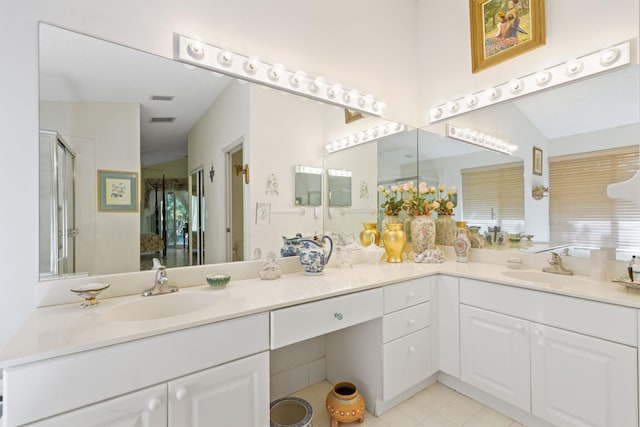 1350 SW 18th St, Boca Raton, FL 33486 - bathroom with double vanity, a shower stall, and tile patterned floors