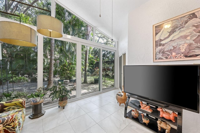 1350 SW 18th St, Boca Raton, FL 33486 - living area featuring healthy amount of natural light and a textured wall