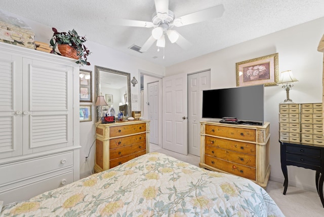 1350 SW 18th St, Boca Raton, FL 33486 - bedroom with carpet flooring, a textured ceiling, and ceiling fan