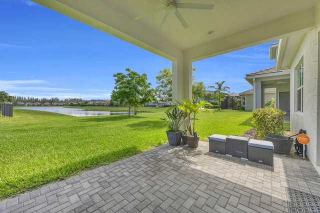 15187 Goldfinch Cir, Westlake, FL 33470 - view of patio with a water view and ceiling fan