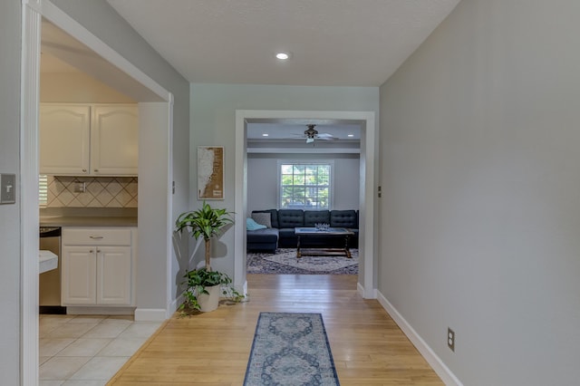 925 SW All American Blvd, Palm City, FL 34990 - hall with light wood-type flooring and recessed lighting