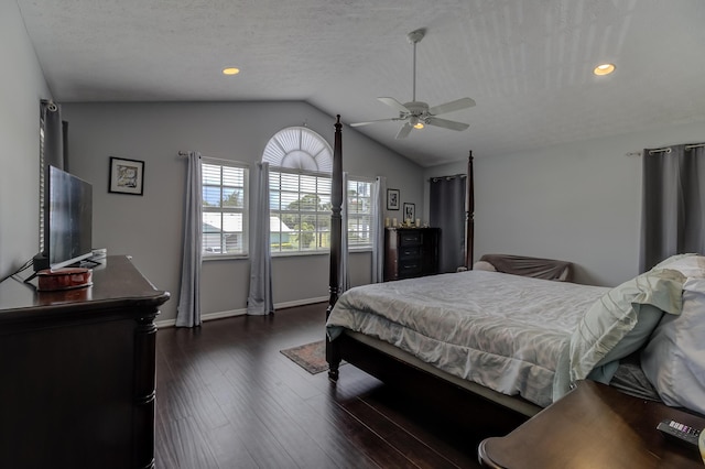 925 SW All American Blvd, Palm City, FL 34990 - bedroom featuring dark wood-type flooring, lofted ceiling, recessed lighting, a ceiling fan, and a textured ceiling