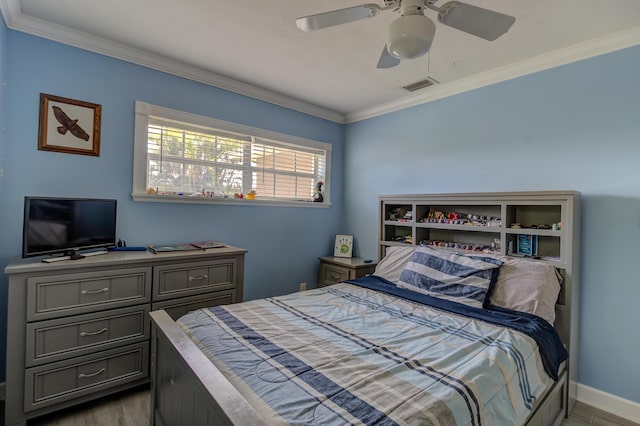 925 SW All American Blvd, Palm City, FL 34990 - bedroom with ornamental molding, wood finished floors, and ceiling fan