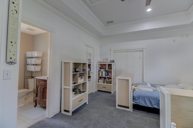 925 SW All American Blvd, Palm City, FL 34990 - bedroom with crown molding, a tray ceiling, and carpet floors