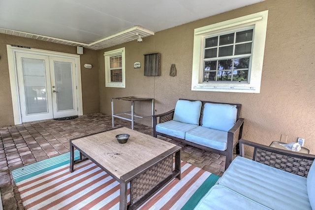 925 SW All American Blvd, Palm City, FL 34990 - wooden terrace with french doors, a patio area, and an outdoor living space