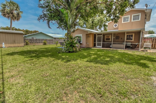 925 SW All American Blvd, Palm City, FL 34990 - fenced backyard with a sunroom and a storage unit