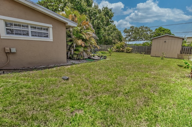 925 SW All American Blvd, Palm City, FL 34990 - view of yard with a storage unit