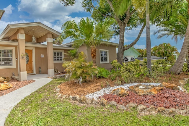 925 SW All American Blvd, Palm City, FL 34990 - view of front of property featuring stucco siding