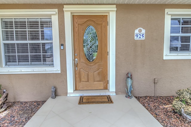 925 SW All American Blvd, Palm City, FL 34990 - view of exterior entry with stucco siding