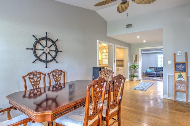 925 SW All American Blvd, Palm City, FL 34990 - dining area featuring light wood-type flooring, a ceiling fan, and lofted ceiling