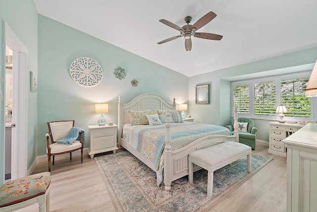 3596 Freshwater Dr, Jupiter, FL 33477 - bedroom with light wood finished floors and a ceiling fan