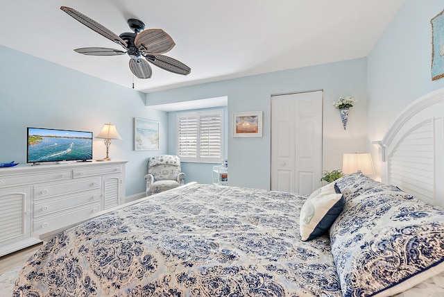 3596 Freshwater Dr, Jupiter, FL 33477 - bedroom featuring ceiling fan, wood finished floors, and a closet