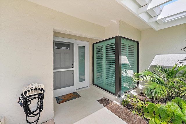 3596 Freshwater Dr, Jupiter, FL 33477 - entrance to property featuring stucco siding