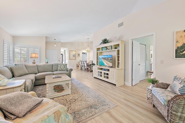 3596 Freshwater Dr, Jupiter, FL 33477 - living area featuring light wood-style flooring