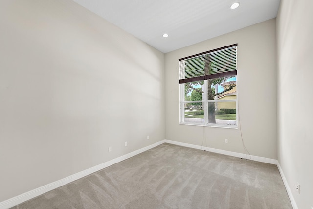 9724 Via Grandezza, Wellington, FL 33411 - spare room featuring light carpet and recessed lighting