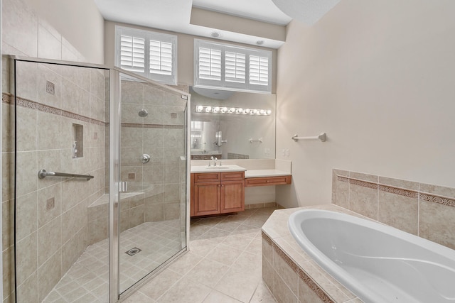 9724 Via Grandezza, Wellington, FL 33411 - full bathroom featuring vanity, a garden tub, a shower stall, and plenty of natural light
