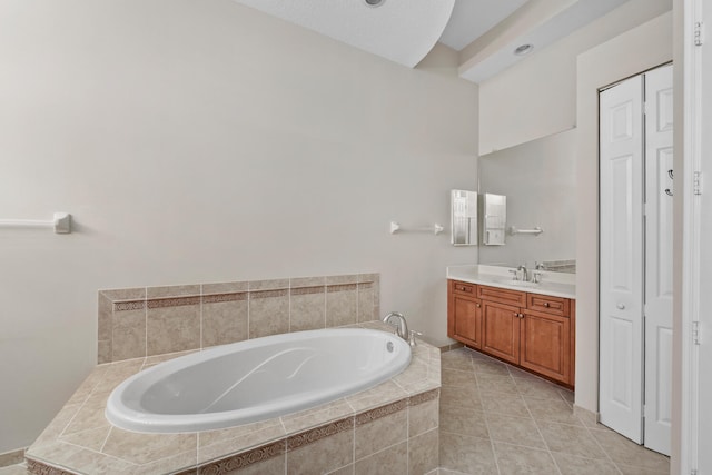 9724 Via Grandezza, Wellington, FL 33411 - full bath with a closet, vanity, a garden tub, and tile patterned flooring
