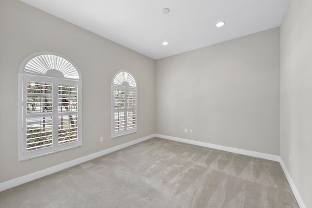 9724 Via Grandezza, Wellington, FL 33411 - empty room featuring carpet and recessed lighting