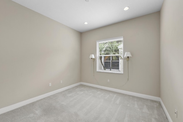 9724 Via Grandezza, Wellington, FL 33411 - unfurnished room featuring light colored carpet and recessed lighting