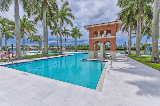 9724 Via Grandezza, Wellington, FL 33411 - community pool featuring a patio