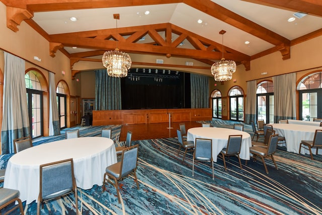 9724 Via Grandezza, Wellington, FL 33411 - dining room with a chandelier, high vaulted ceiling, beam ceiling, recessed lighting, and carpet floors
