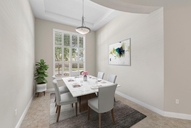 9724 Via Grandezza, Wellington, FL 33411 - dining space featuring a raised ceiling and light tile patterned floors