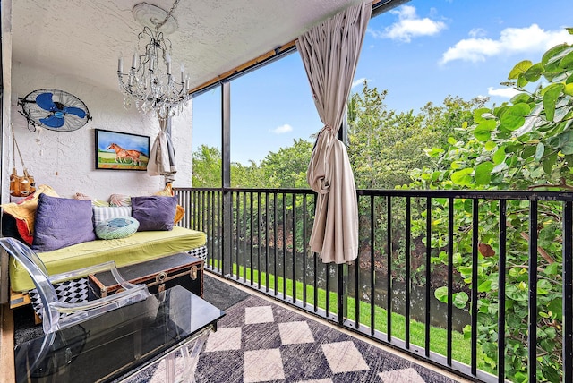 1605 S US Highway 1 Unit F202, Jupiter, FL 33477 - sunroom / solarium featuring a chandelier
