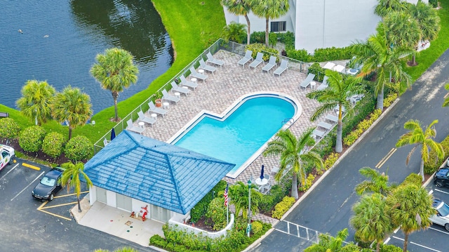 1605 S US Highway 1 Unit F202, Jupiter, FL 33477 - view of subject property with a pool area and a nearby body of water