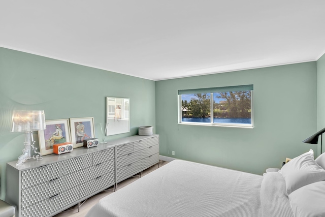 2 Colonial Club Dr Unit 203, Boynton Beach, FL 33435 - bedroom featuring wood finished floors and baseboards
