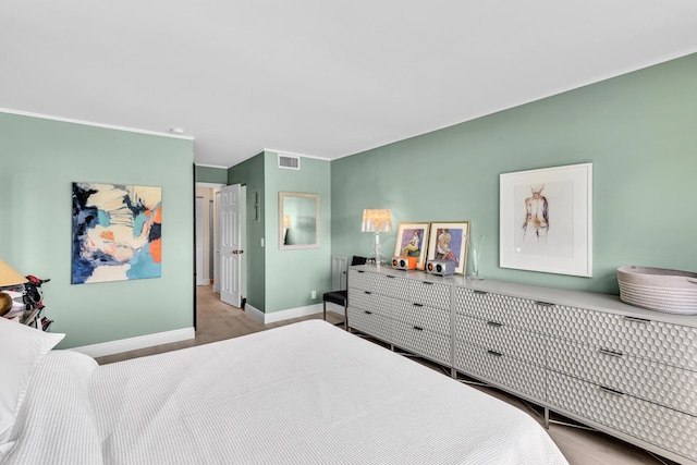 2 Colonial Club Dr Unit 203, Boynton Beach, FL 33435 - bedroom featuring crown molding and wood finished floors