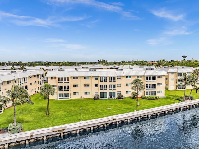 2 Colonial Club Dr Unit 203, Boynton Beach, FL 33435 - view of apartment building / complex featuring a water view